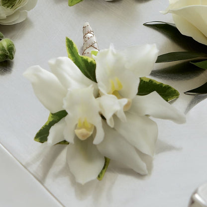 White Mini Cymbidium Boutonniere – MAGNOLIA'S FLOWER SHOP INC, Garden City MI
